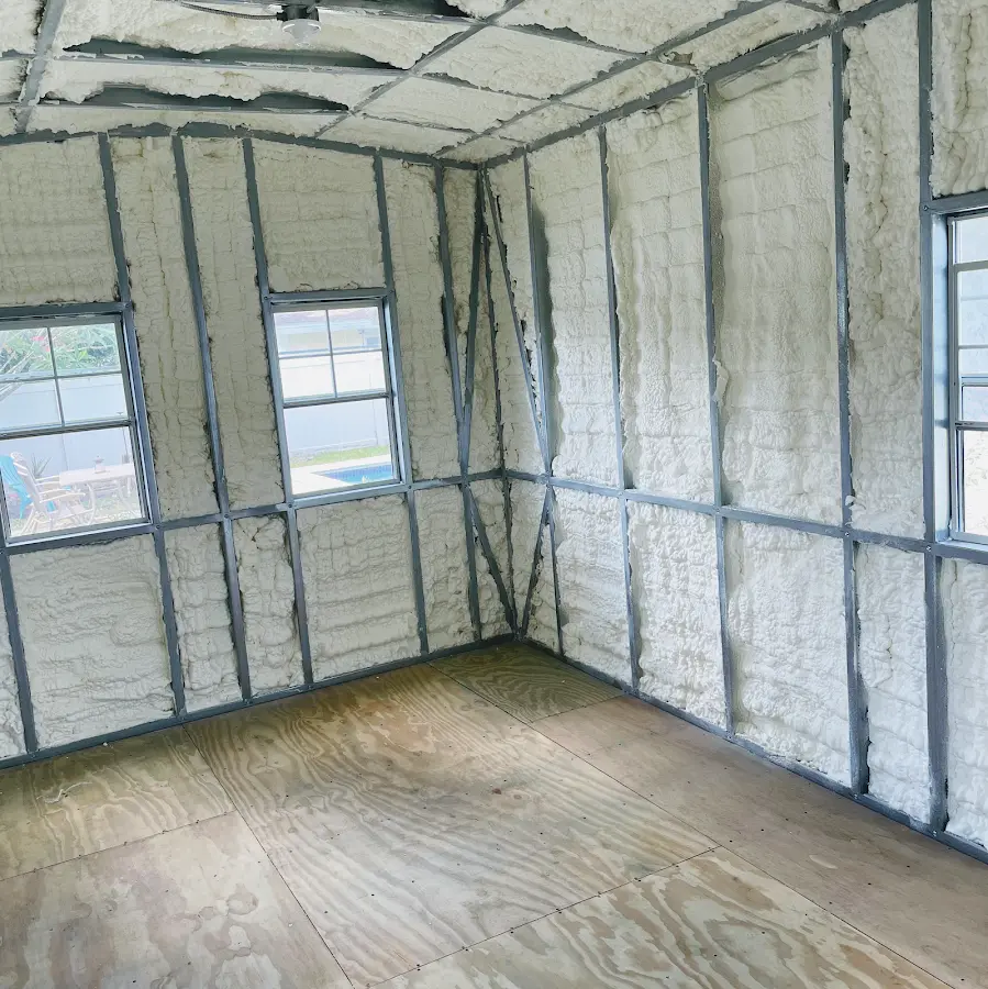 Closed-cell spray foam insulation applied to wall cavities in a residential project in Joplin